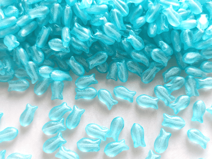 Fish beads 10x6mm - light Caribbean blue glitter
