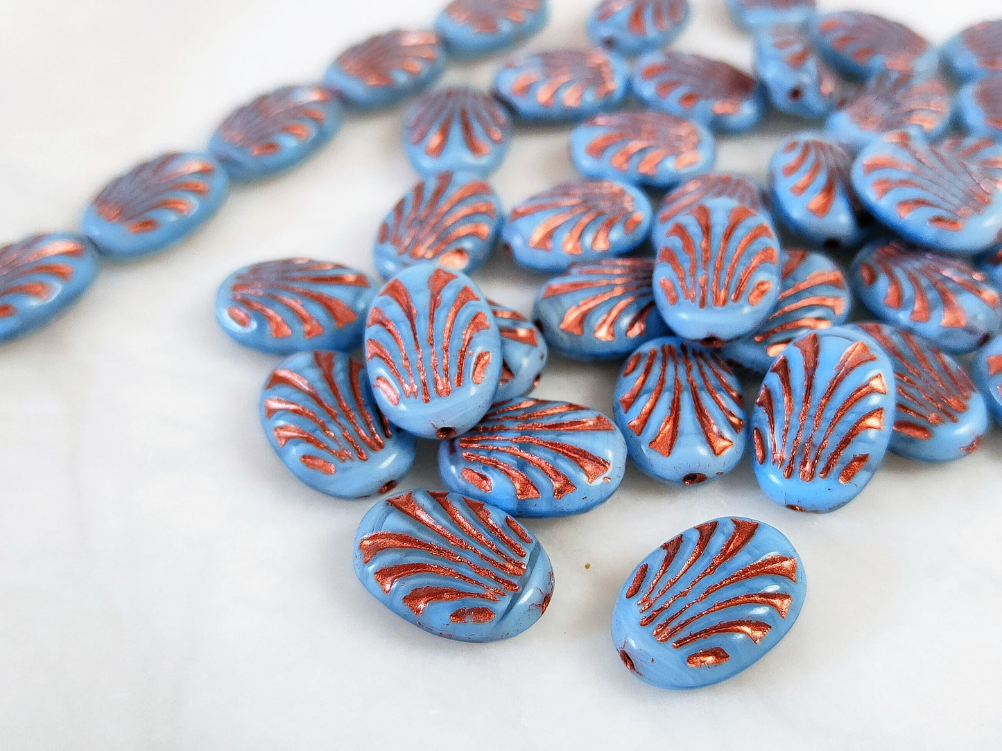 Oval ornament beads 17mm - light blue & copper