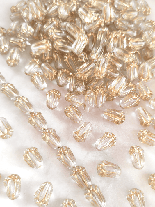 Tulip beads 12x8mm - colorless & gold
