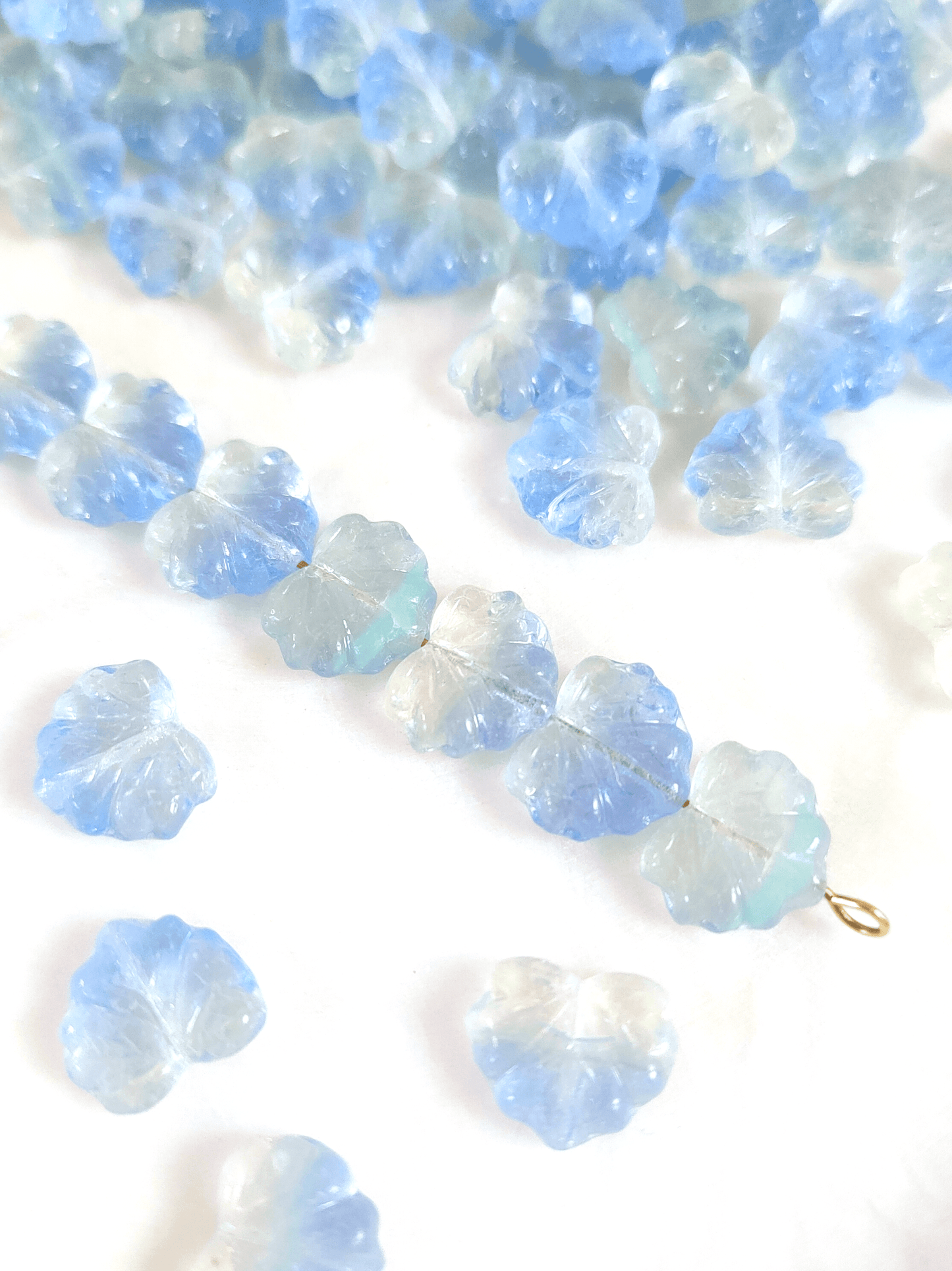 Vine leaf beads 13mm - colorless & ice blue