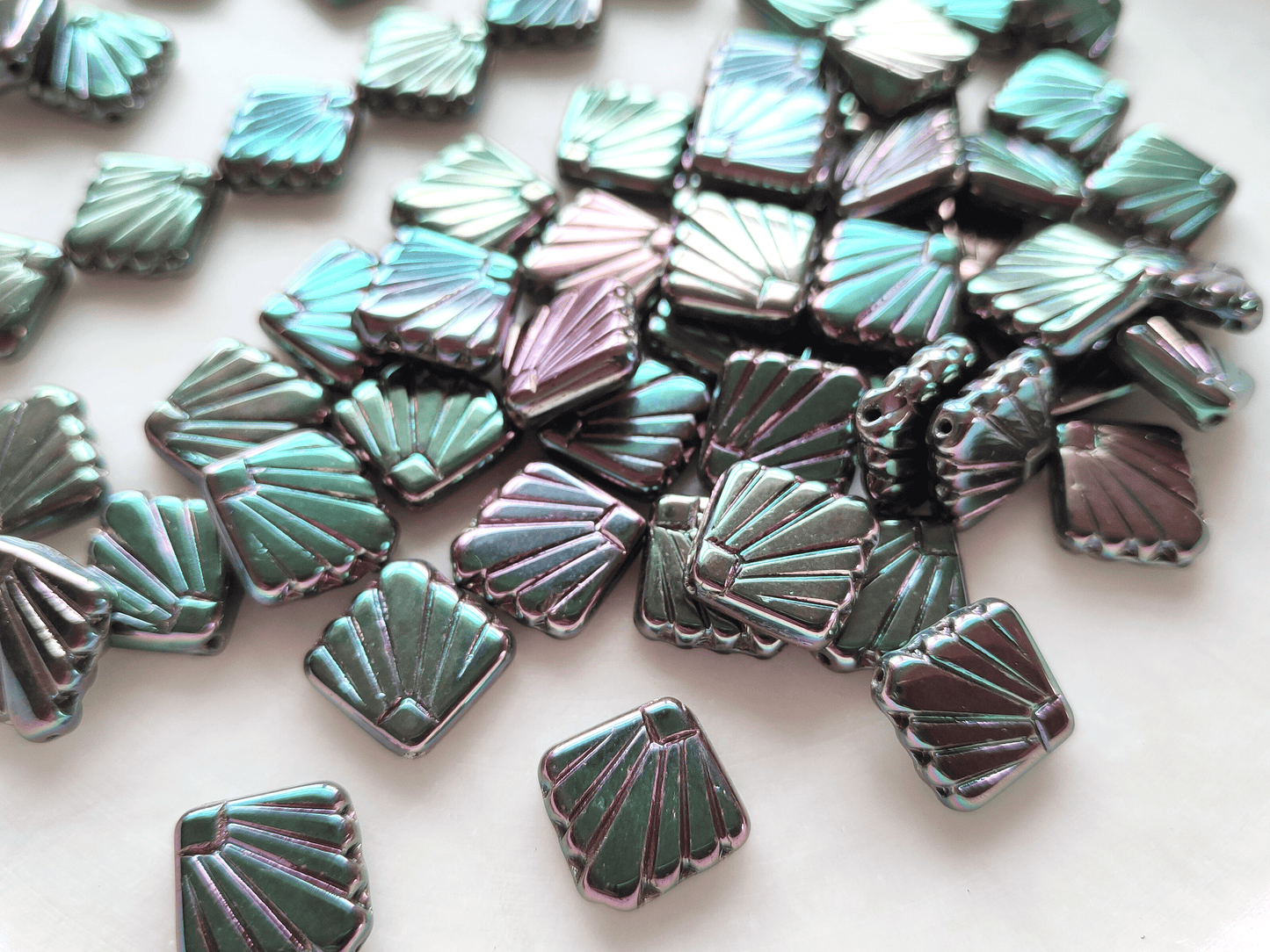 Fan ornament beads 17mm - metallic dark green & purple