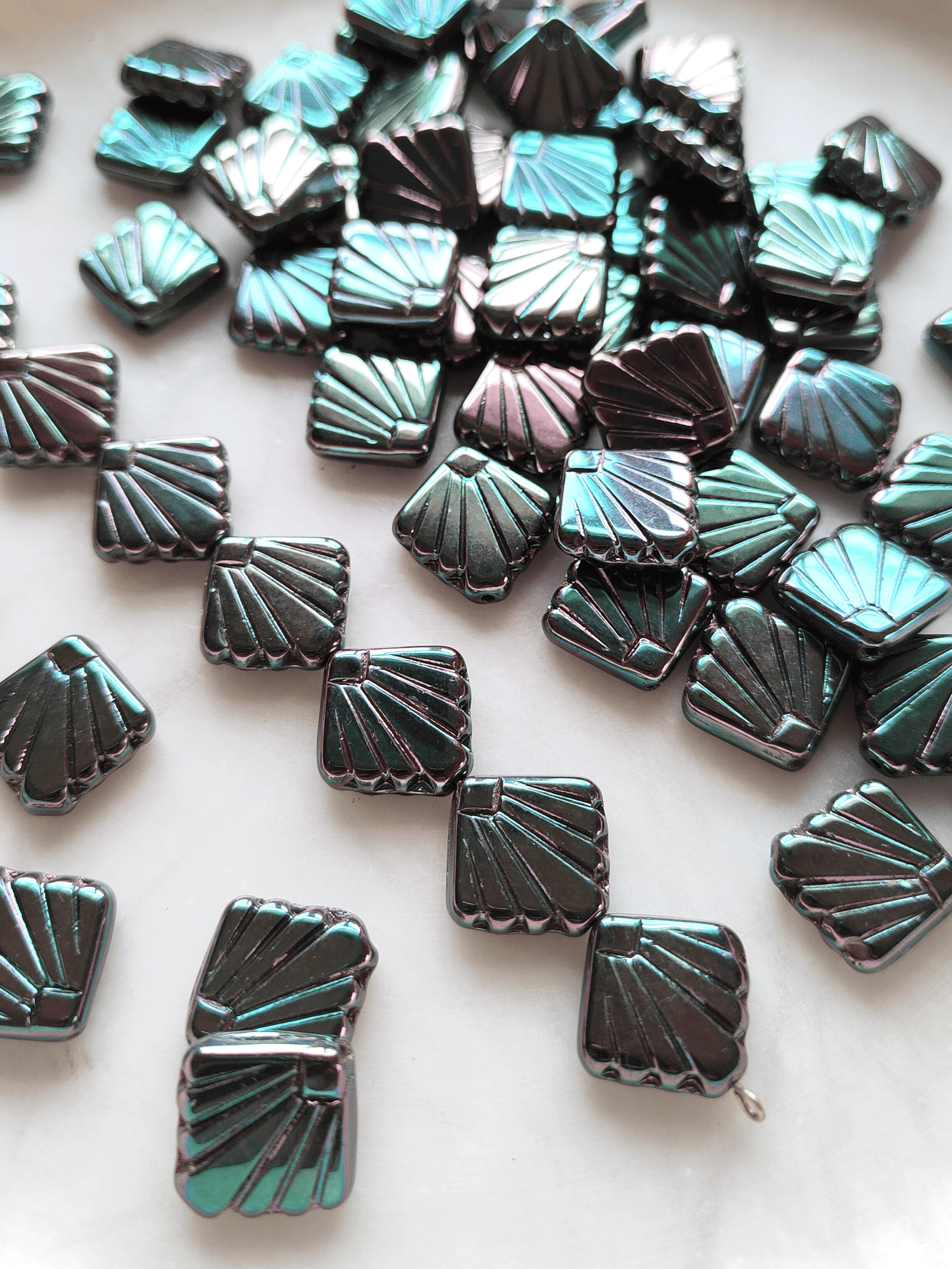 Fan ornament beads 17mm - metallic dark green & purple