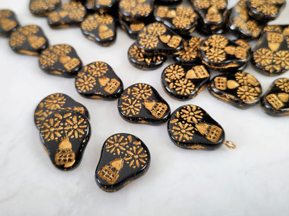 Skull beads 20x16mm - black & gold