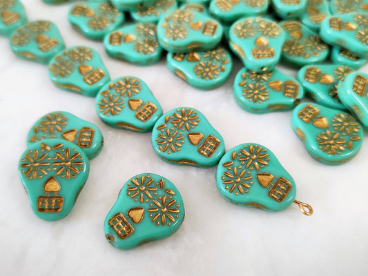 Skull beads 20x16mm - green & gold