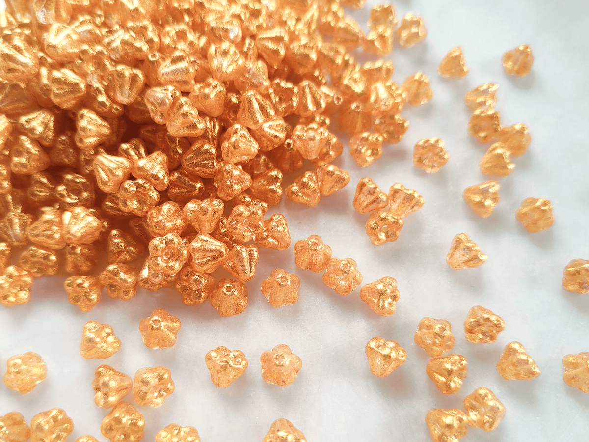 Bell flower beads 4x6mm - gold glitter