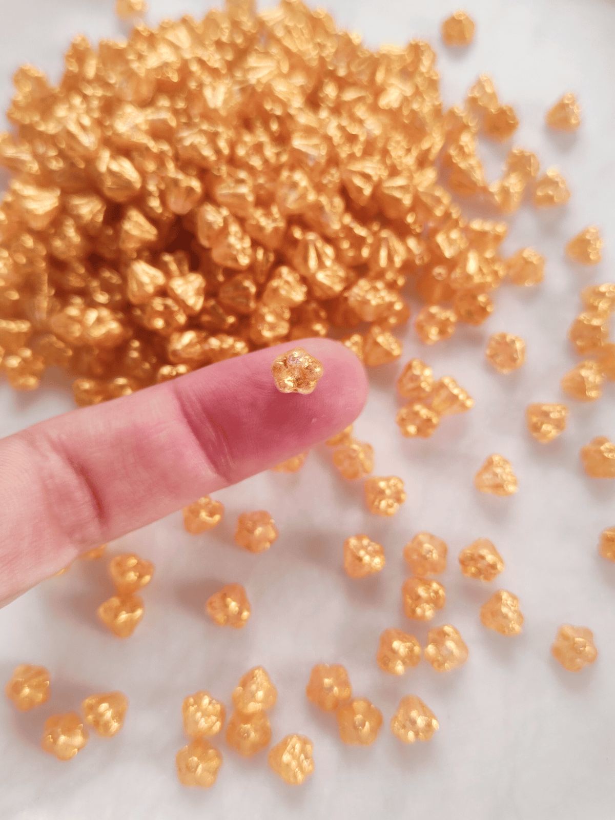 Bell flower beads 4x6mm - gold glitter