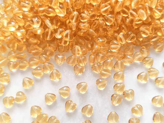 Love heart beads 6mm - golden yellow