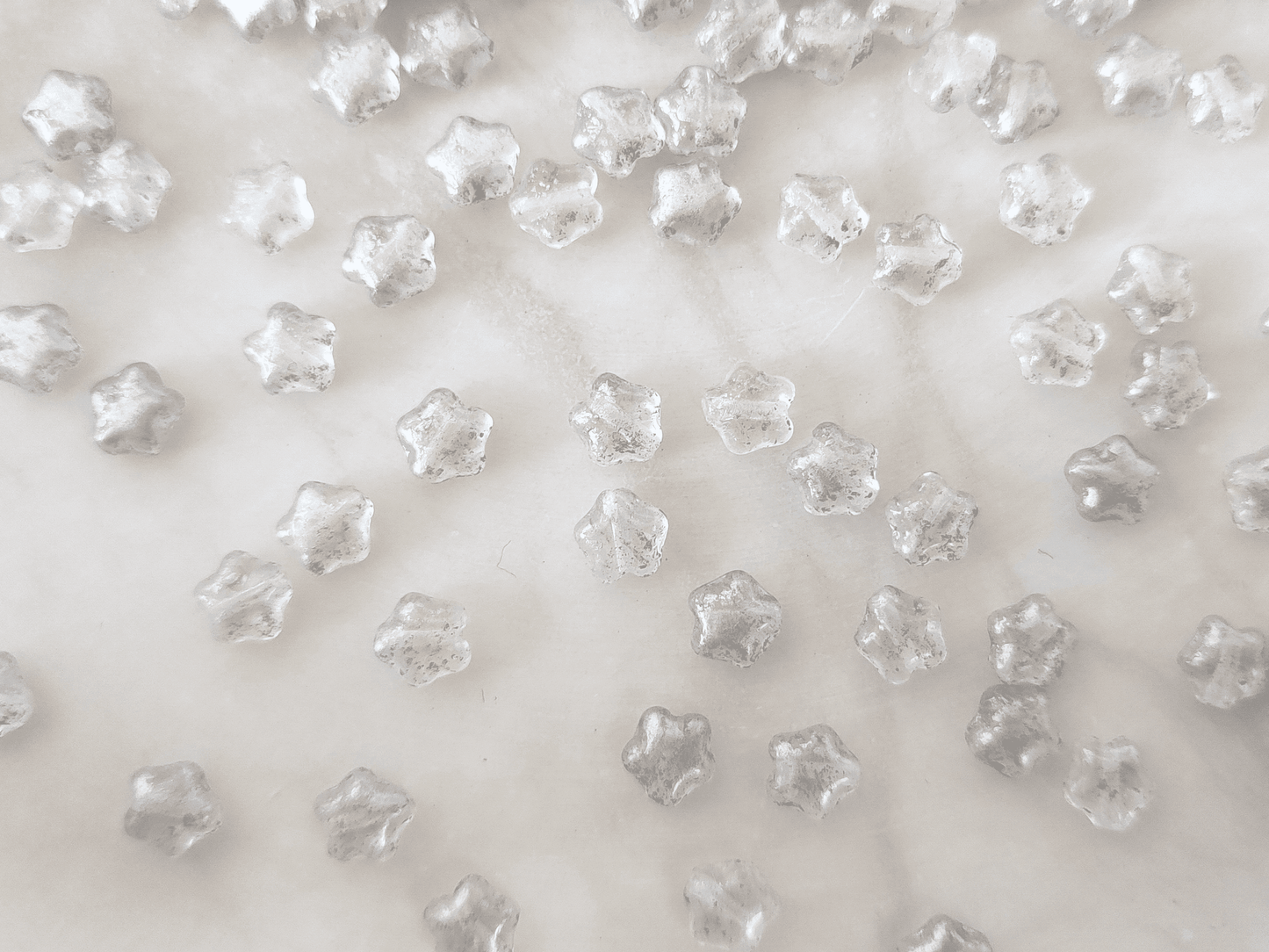 Star beads 6mm - colorless & silver