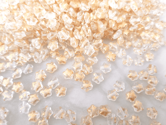 Star beads 6mm - colorless & gold