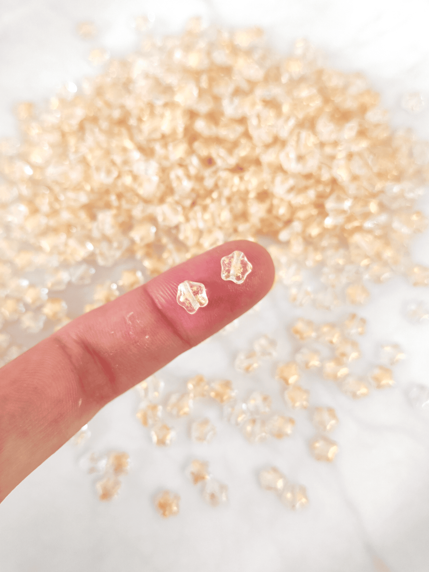 Star beads 6mm - colorless & gold