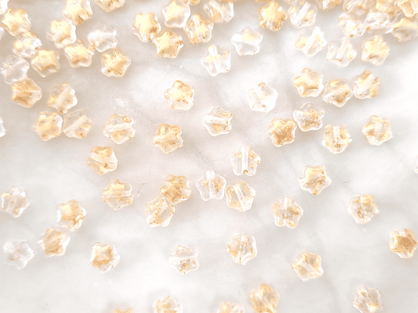 Star beads 6mm - colorless & gold