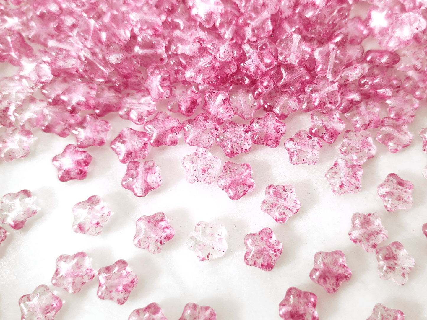 Star beads 8mm - colorless & pink speckles
