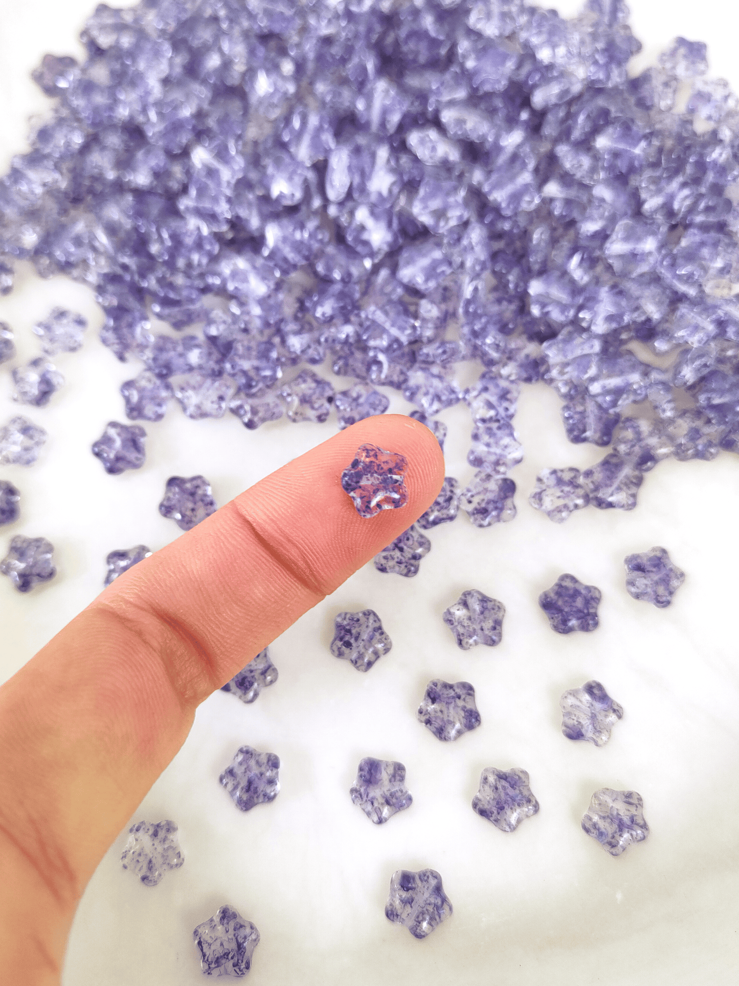 Star beads 8mm - colorless & dark purple speckles