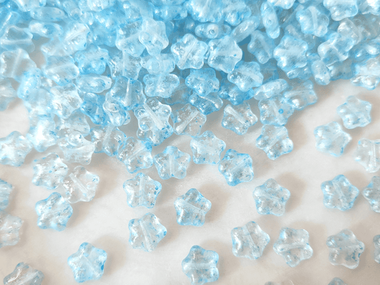 Star beads 8mm - colorless & light blue speckles