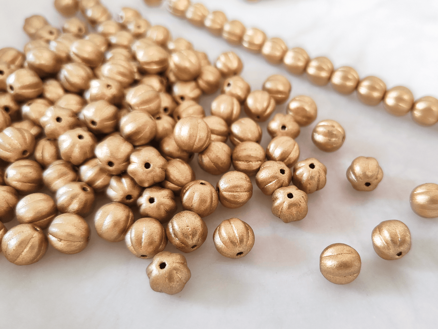 Melonen 8mm - matt Gold