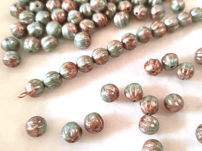 Melon beads 8mm - mint green, red & silver shimmer