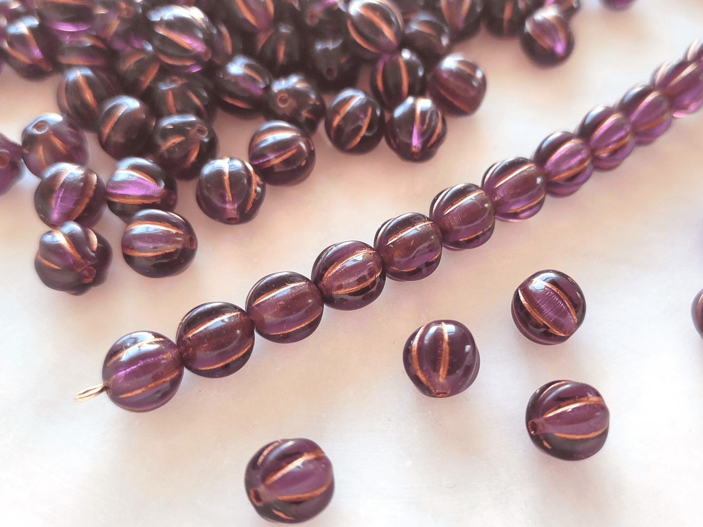 Melon beads 8mm - purple & bronze