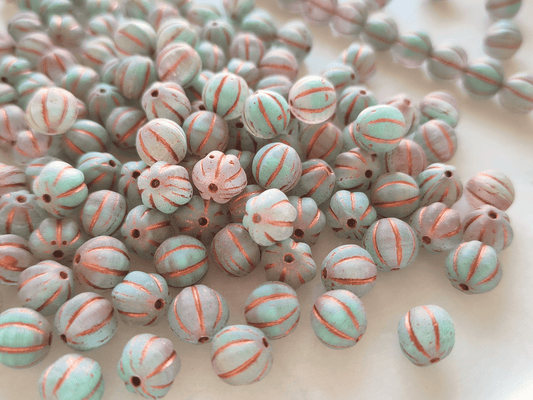 Melon beads 8mm - colorless, light blue & bronze