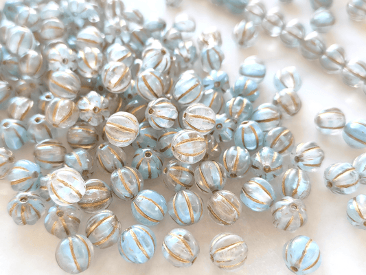 Melon beads 8mm - colorless, light blue & gold