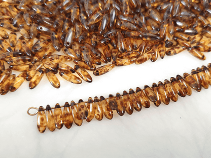 Dagger beads 3x11mm - brown Picasso