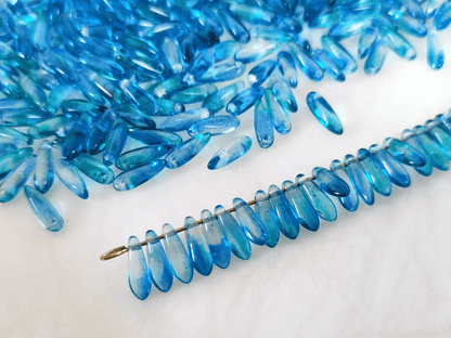 Dagger beads 3x11mm - Caribbean blue