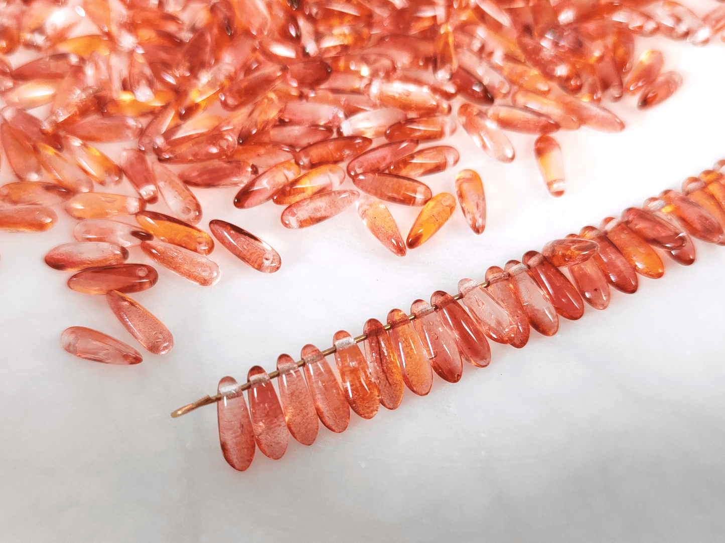 Dagger beads 3x11mm - orange