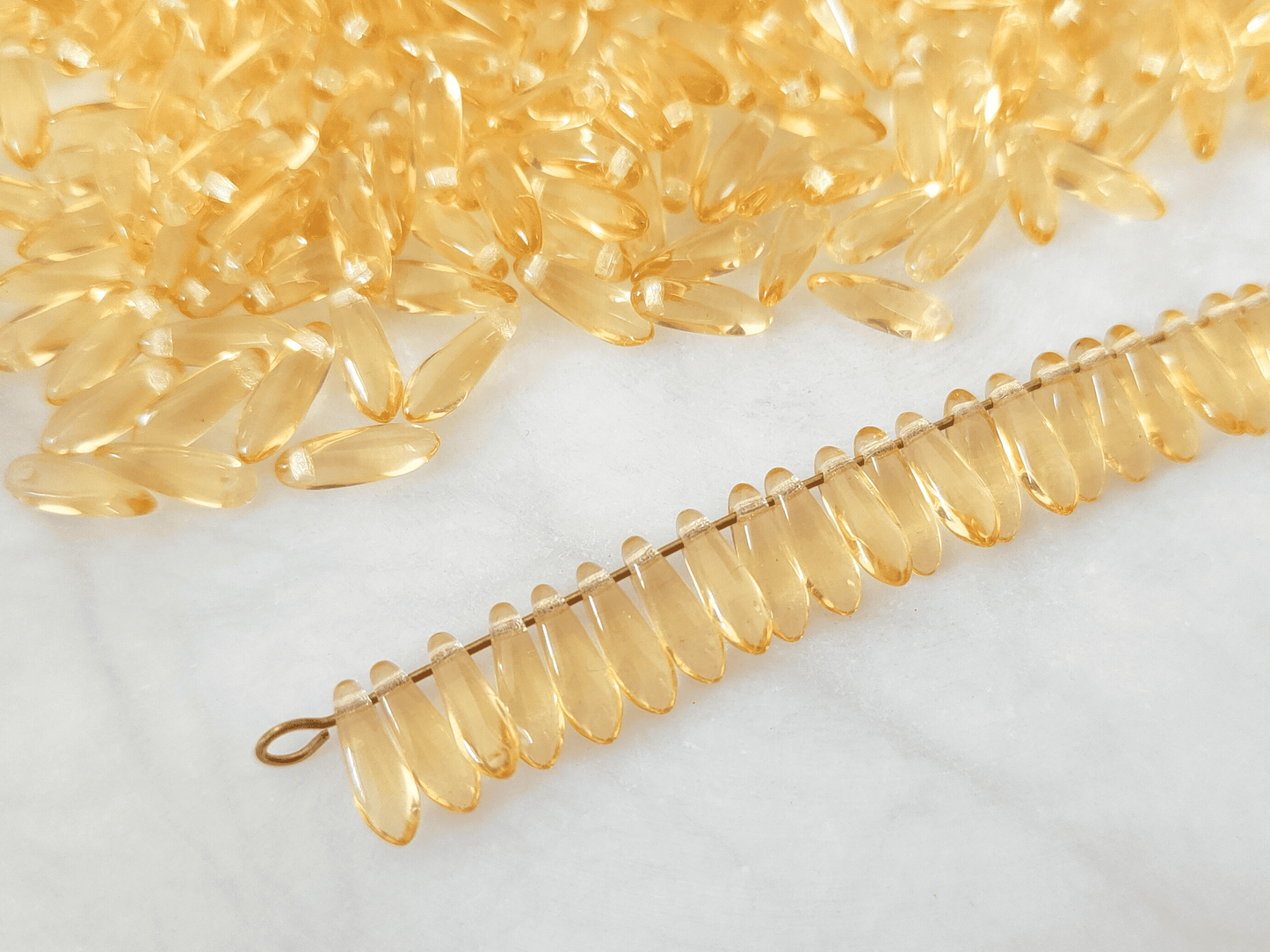 Dagger beads 3x11mm - yellow