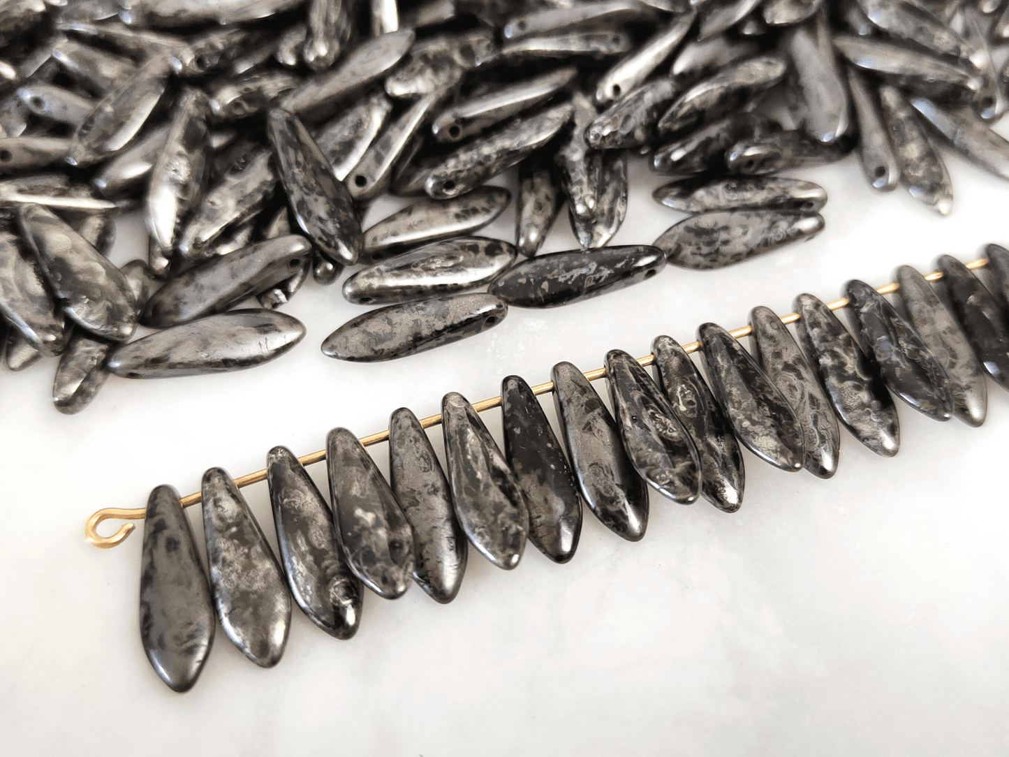 Dagger beads 5x16mm - black & silver patterning