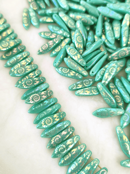 Dagger beads 5x16mm - turquoise & iris spiral motif