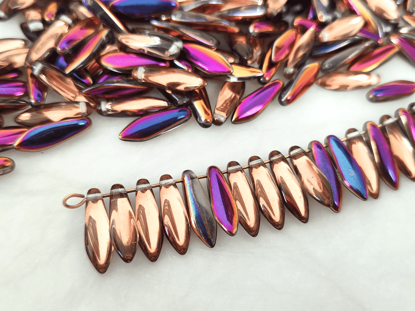 Dagger beads 5x16mm - copper & metallic purple