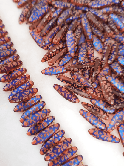Dagger beads 5x16mm - red, blue & rose motif