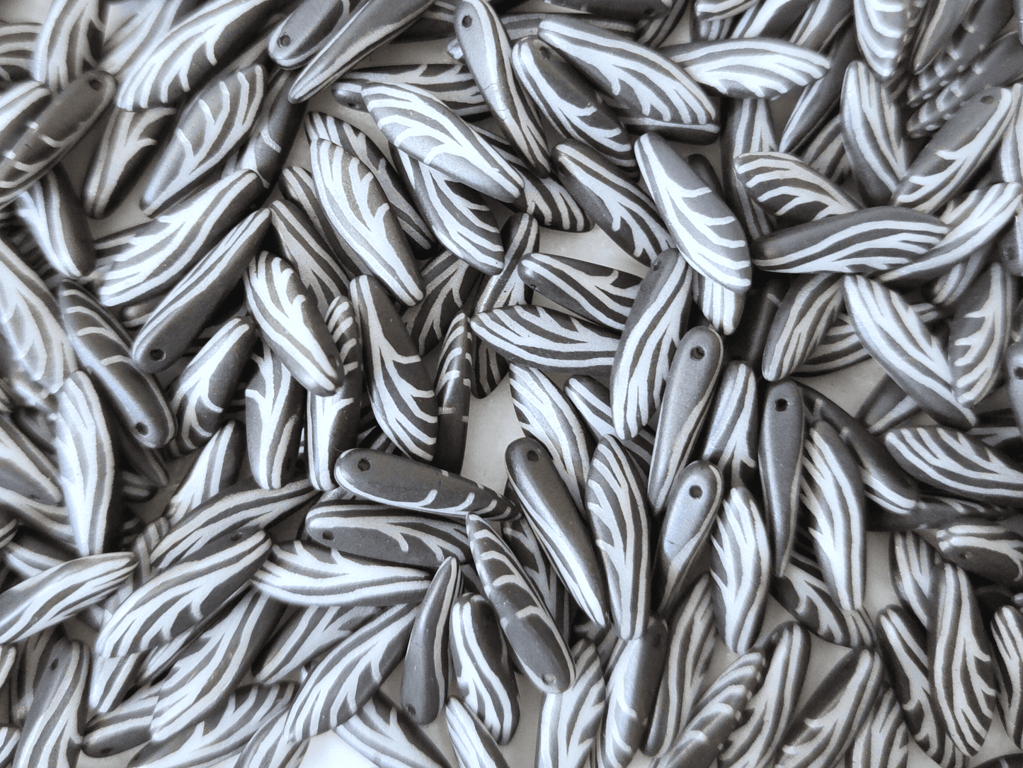 Dagger beads 5x16mm - black & insect wing motif