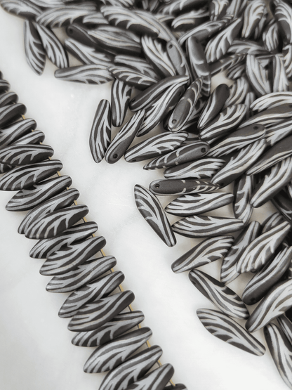 Dagger beads 5x16mm - black & insect wing motif