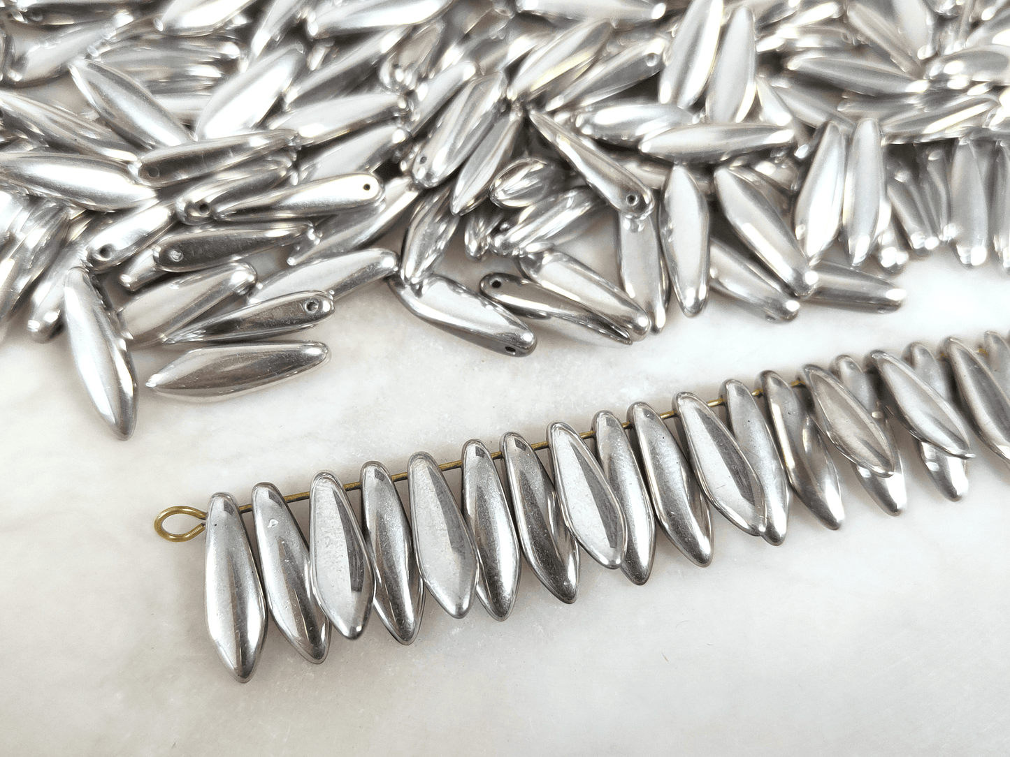Dagger beads 5x16mm - shiny silver