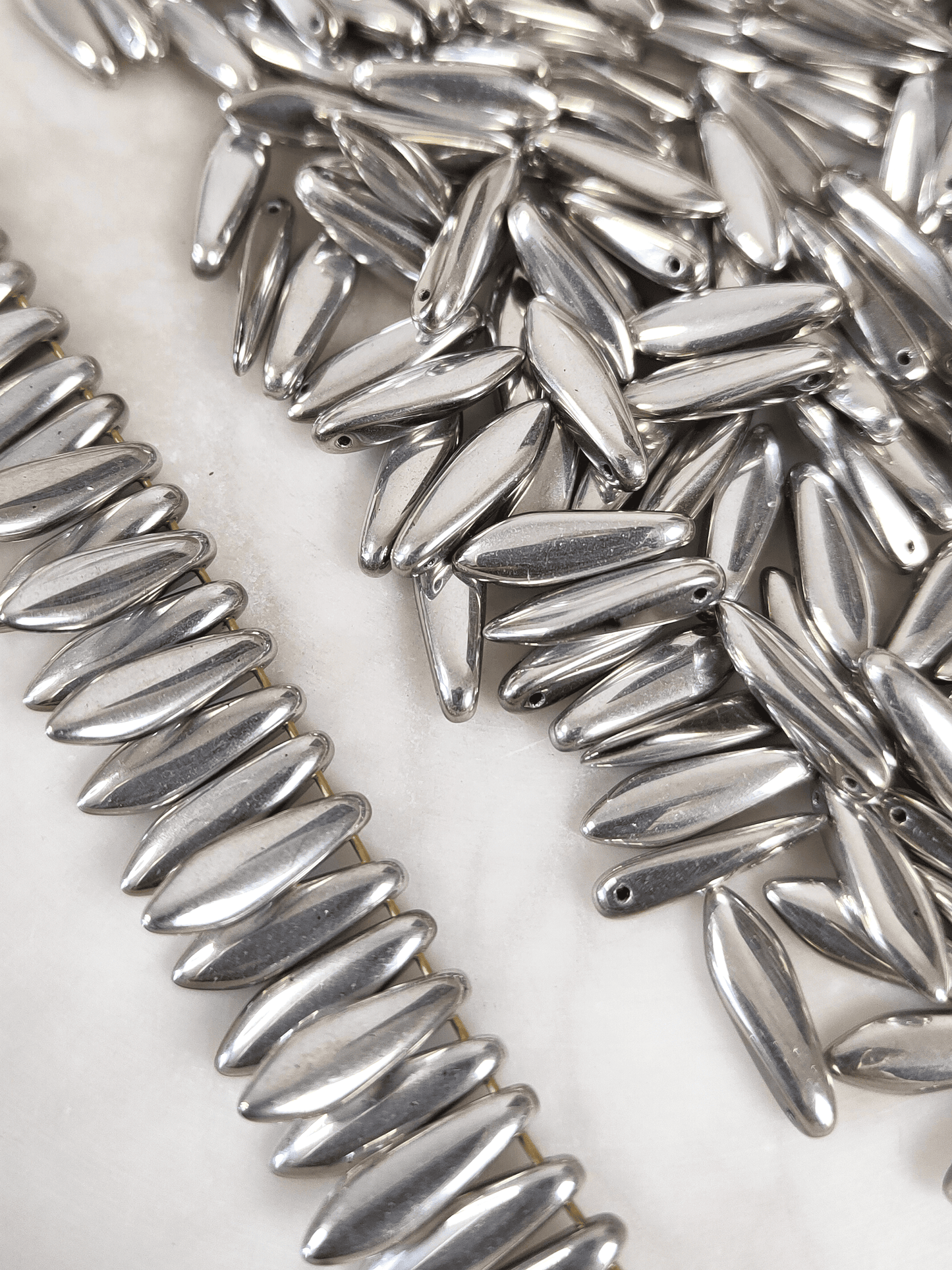 Dagger beads 5x16mm - shiny silver