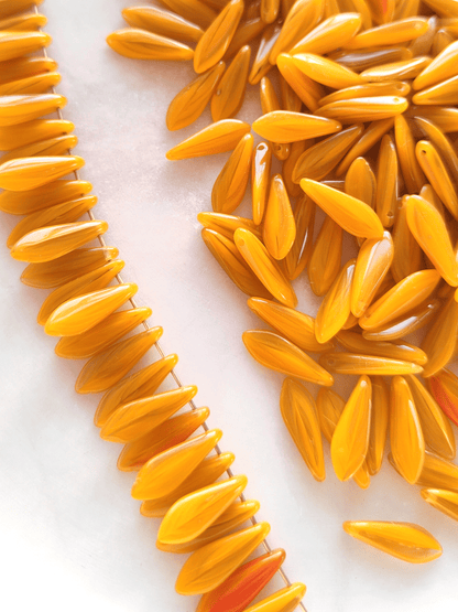 Dagger beads 5x16mm - colorless, yellow & orange