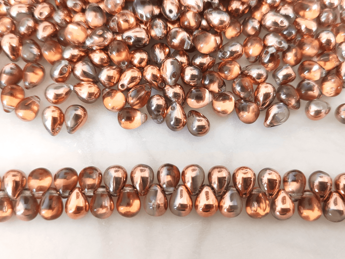 Drop beads 5x7mm - half copper