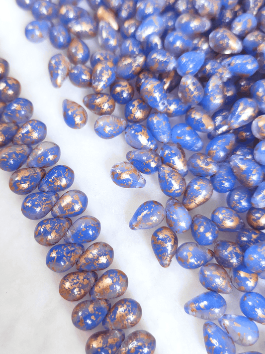 Drop beads 6x9mm - blue & copper speckles