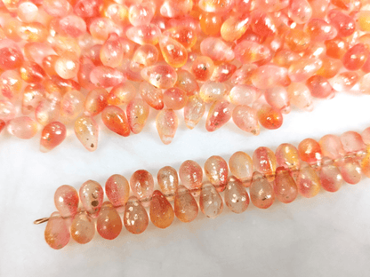 Drop beads 6x9mm - ombre prange & red, golden speckles
