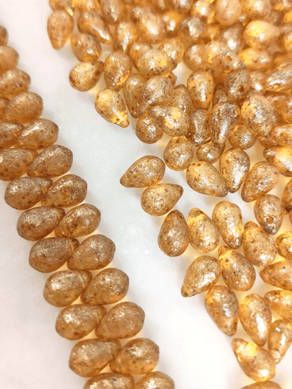 Drop beads 6x9mm - honey & gold shimmer