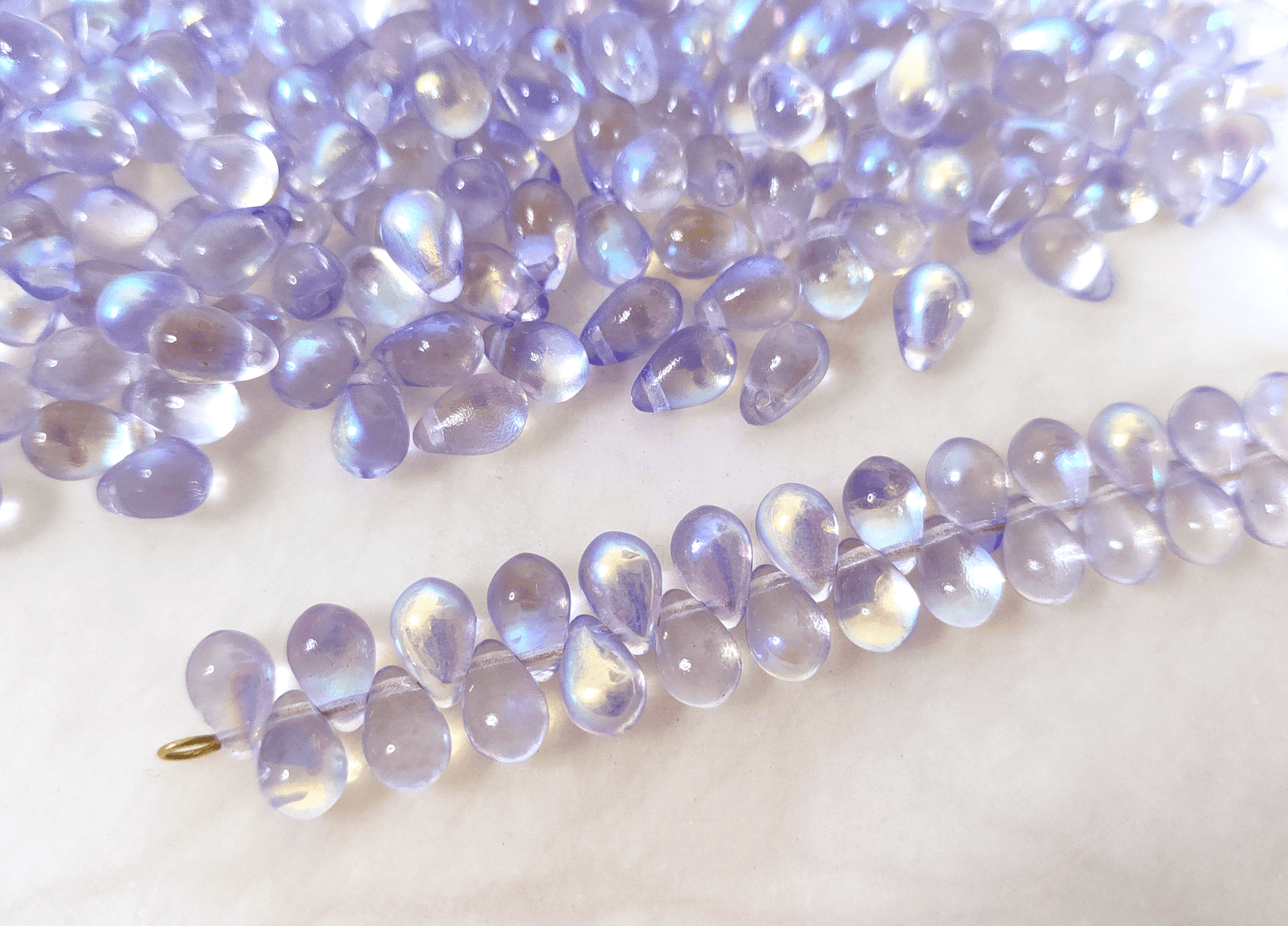 Drop beads 6x9mm - pastel violet AB