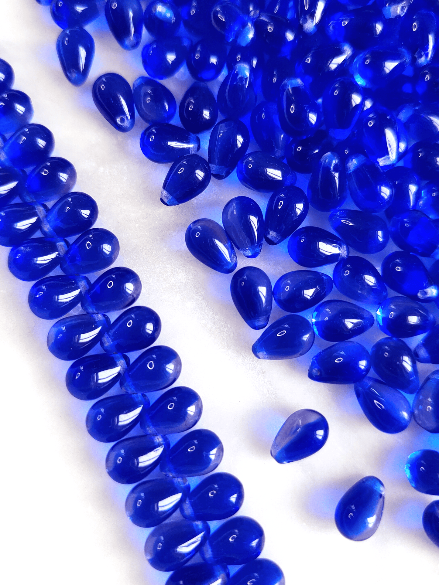 Drop beads 6x9mm - dark royal blue & colorless