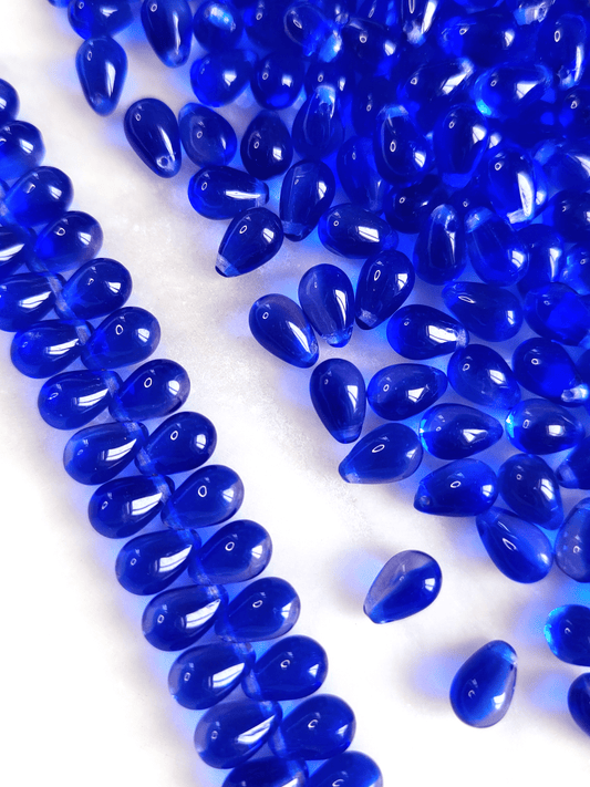 Drop beads 6x9mm - dark royal blue & colorless