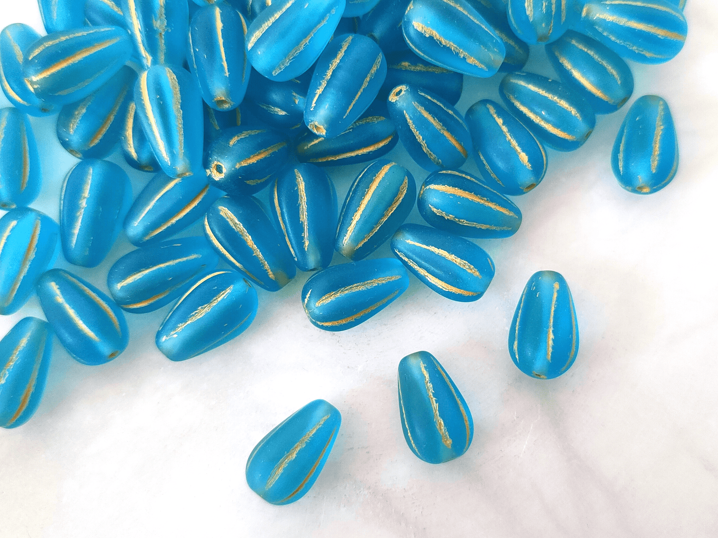 Melon drop beads 13x8mm - matt turquoise & yellow