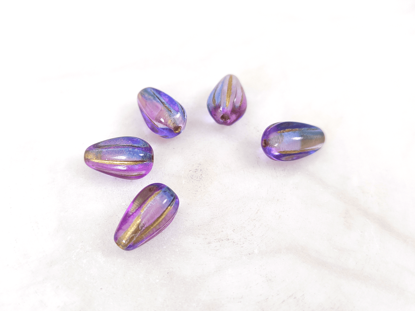 Melon drop beads 13x8mm - ombre blue & purple, gold