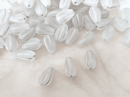 Melon drop beads 13x8mm - matt colorless & silver