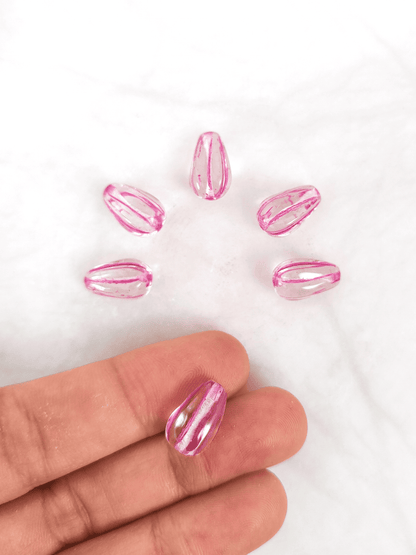 Melon drop beads 13x8mm - colorless & pink