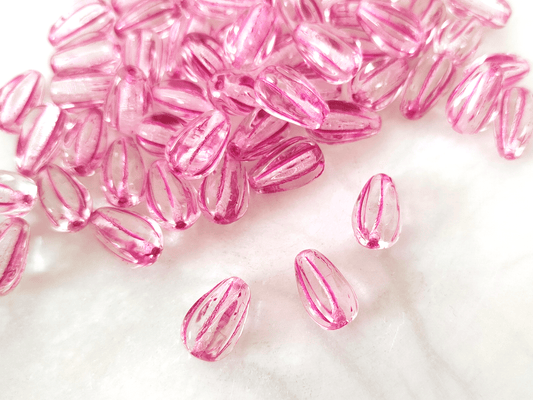 Melon drop beads 13x8mm - colorless & pink