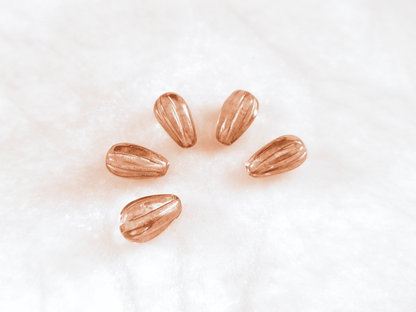 Melon drop beads 13x8mm - light brown & gold