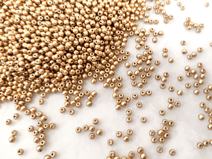 2mm round beads - matt gold